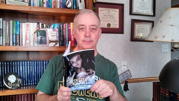 Jeff Harshbarger reading Laura's book.