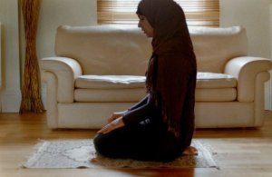 Muslim woman praying