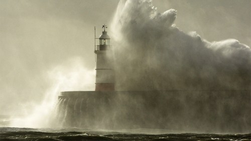 lighthouse in storm tsunami